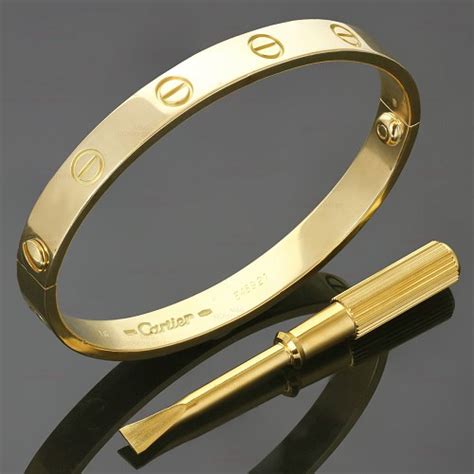 gold cartier bangle|cartier gold bracelet with screws.